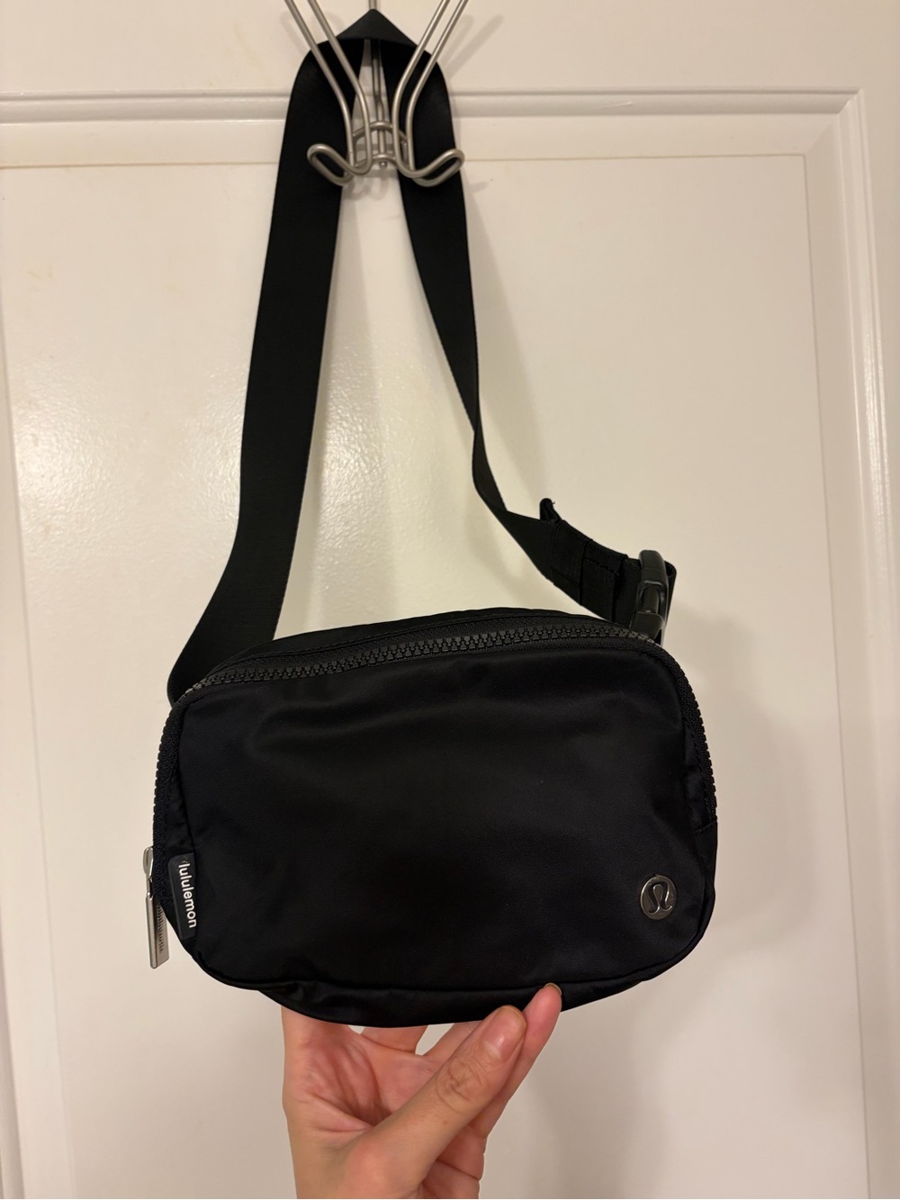 Like new: $38 LULULEMON Everywhere Belt Bag 1L, Black w/ Silver Hardware